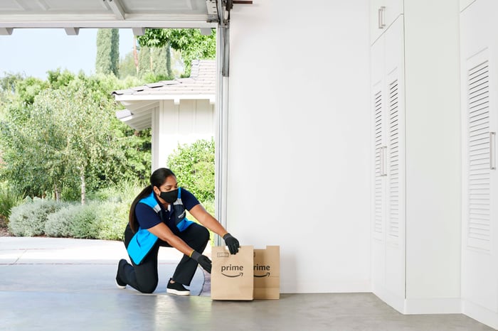 woman delivering Prime groceries in garage