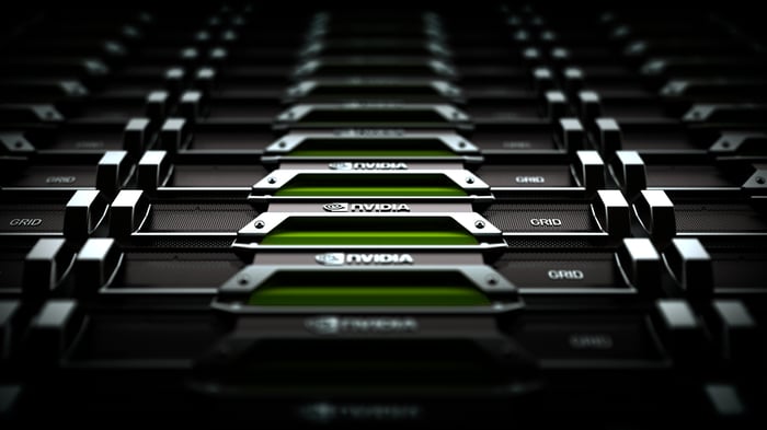 A row of graphics cards with the NVIDIA logo stamped on the side.