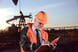 16_06_15 A man with a notebook in front of oil well _GettyImages-156525694