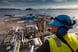 17_06_14 A man Looking down over an energy processing facility _GettyImages-464201833