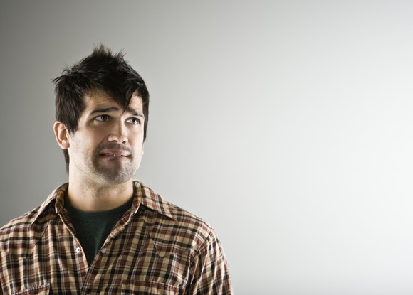 A man looking fearful.