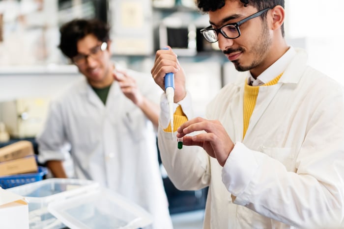 Two scientists working in a laboratory.