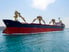 Three quarters view of a dry bulk cargo ship