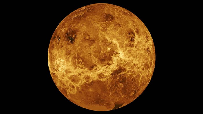 Orange image of Venus on a field of black.