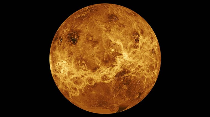 Orange image of Venus on a field of black.