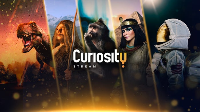 CuriosityStream logo in front of content posters.