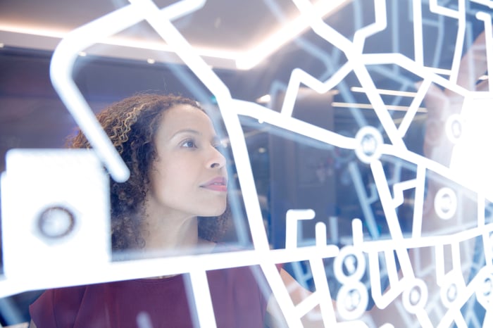 A person operates digital interface technology. 