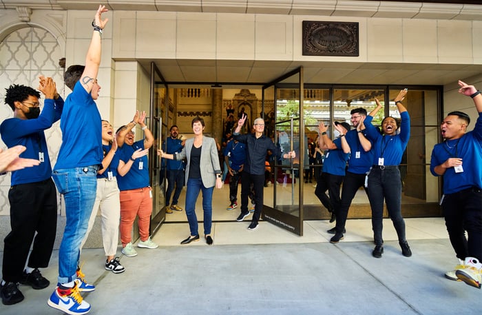 Deidre O'Brien and Tim Cook at the opening of a new Apple Store.