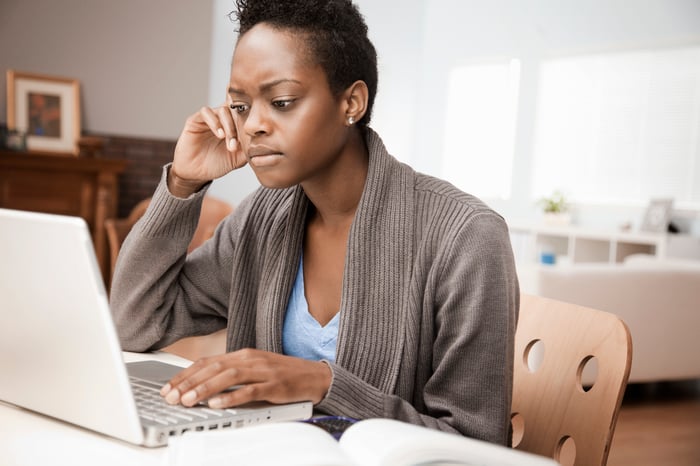 Person staring at laptop screen