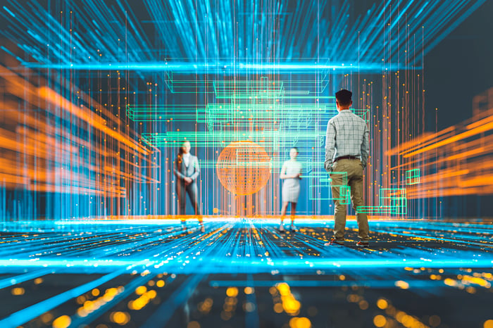 Three people standing in a futuristic VR grid.