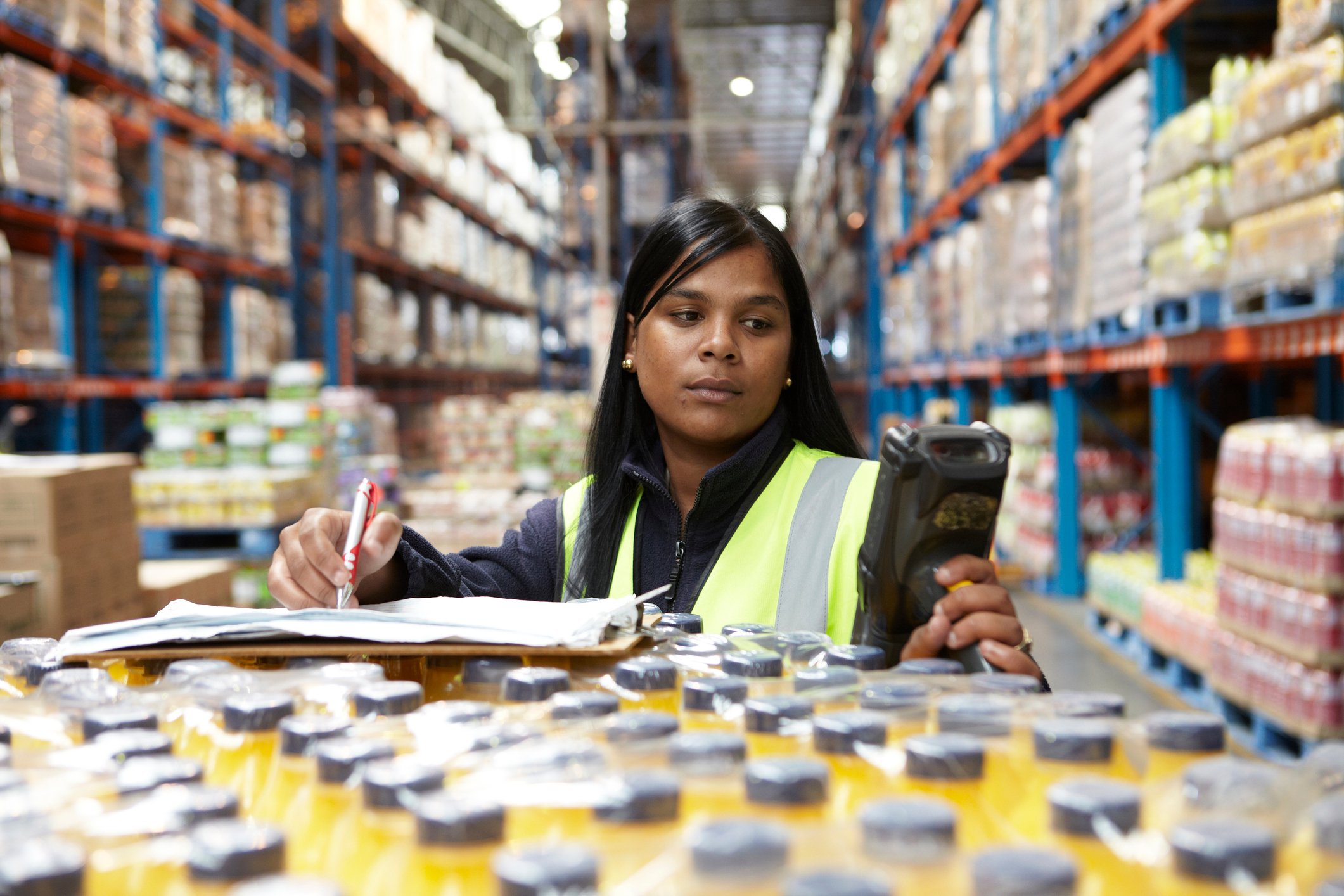 Worker in a distribution warehouse logistics source Getty