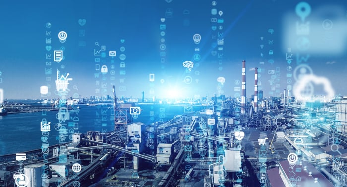 A image showing digital data coming from buildings.