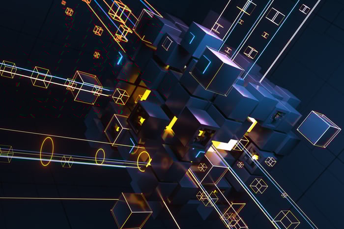 Blocks coming together in a programming space. 