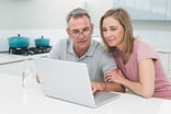 GettyImages-466429322 -- Couple looking at computer