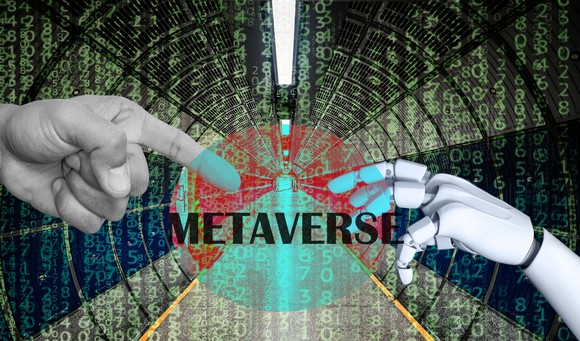 The word Metaverse hangs between two hands, one human and one robotic.