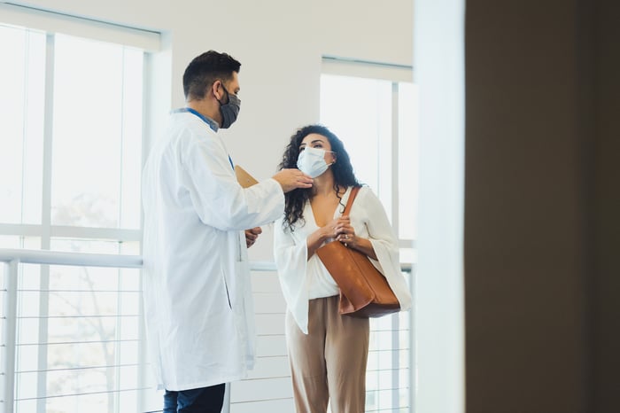A doctor talks to a patient.
