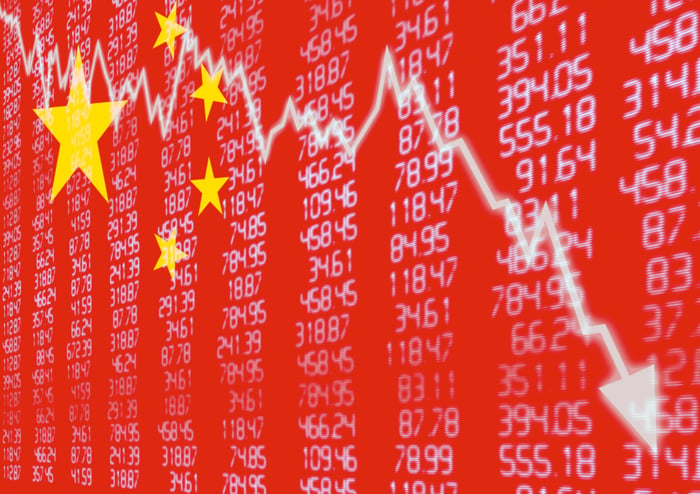 A falling stock market graph on China's flag as the background.