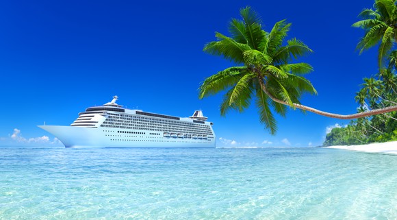 A cruise ship off a tropical island.