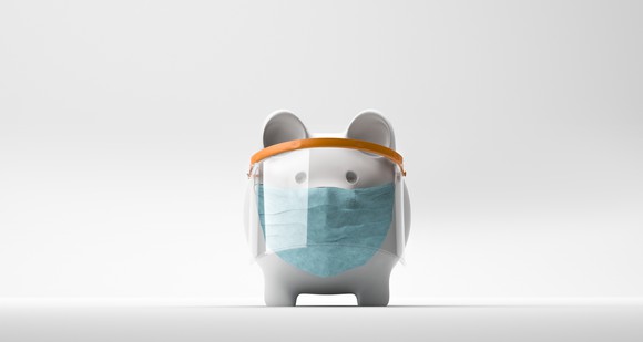 Piggy bank wearing a face mask.