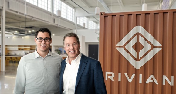 Rivian CEO RJ Scaringe with Ford's executive chairman, Bill Ford.
