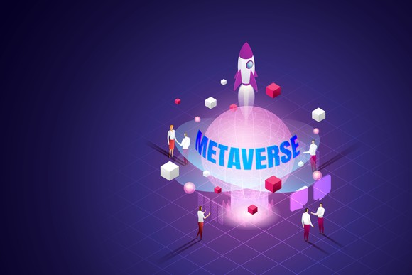 Six people stand around a projection of a planet with a rocket above it, and the word metaverse is across the planet.