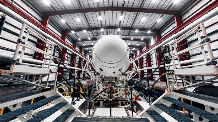 SpaceX Crew Dragon spacecraft in the hangar before takeoff.