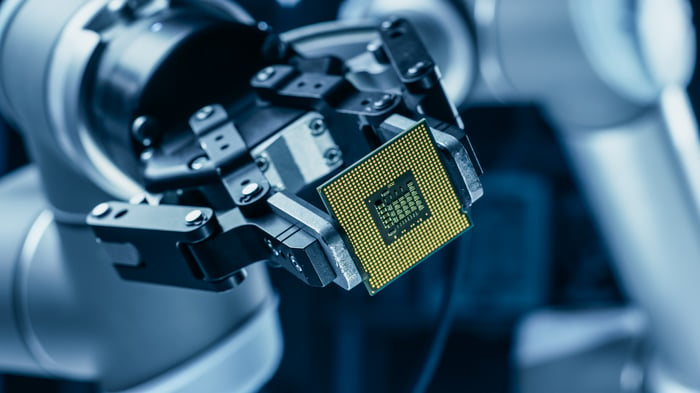 Manufacturing a computer chip.