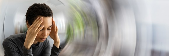 Someone with her head in her hands.