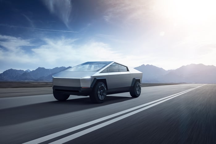 Tesla Cybertruck driving on the road.