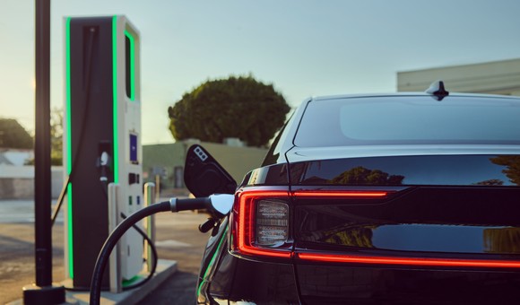 Polestar EV charging at an Electrify America charging station.