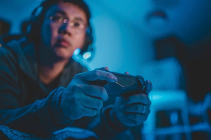 guy playing console game