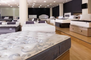 Mattress displays at a furniture store