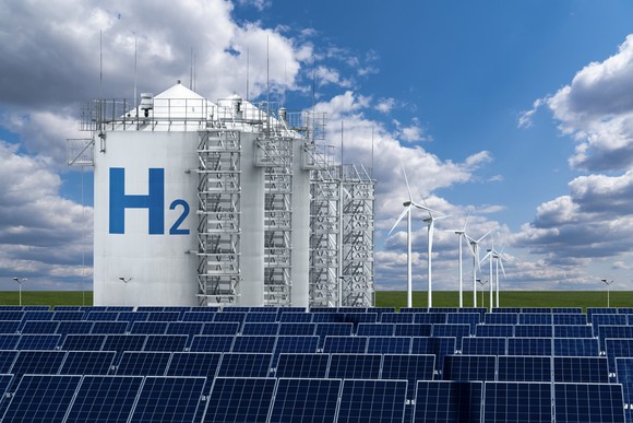 Image of green hydrogen facility with wind and solar power.