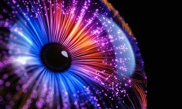 3D rendering of an eye formed from lines of glowing fiber optic cable.