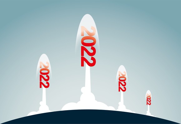 Four rockets launching each labeled 2022.