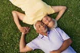 Couple lying on grass