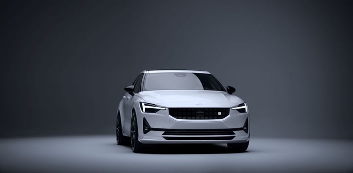 A white Polestar 2 sedan.