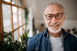 A retiree smiling.