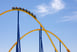 Yellow Roller Coaster Blue Background