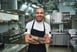Getty - cheerful young chef with tattoos