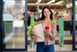 woman leaving grocery store mobile pay