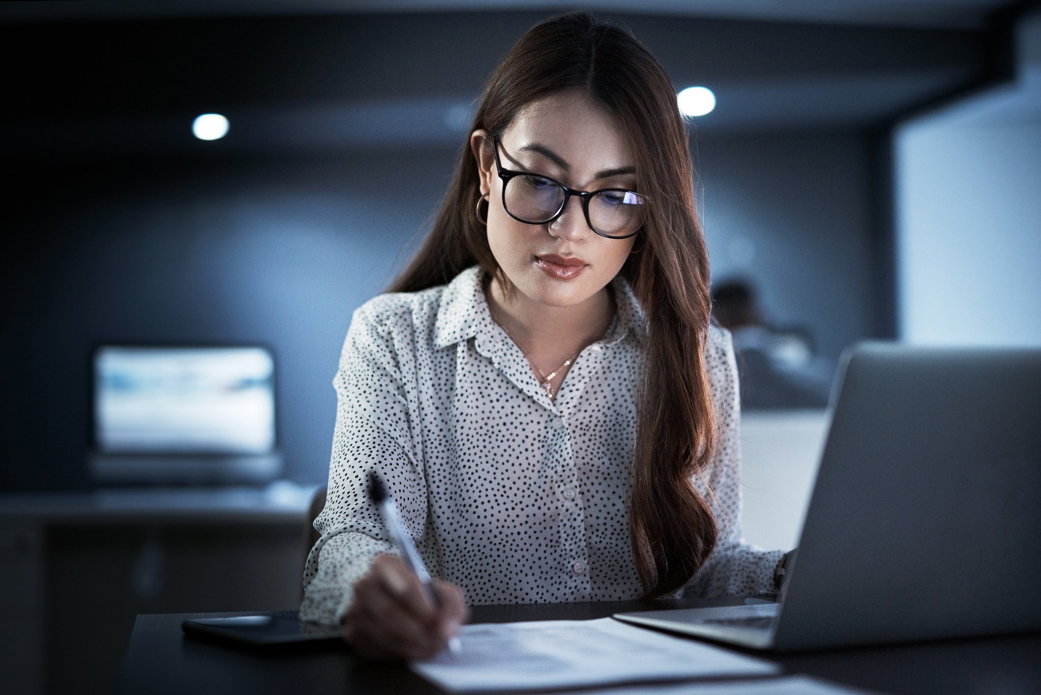 an accountant working with a computer in an office