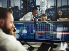 Stock traders trading desk getty