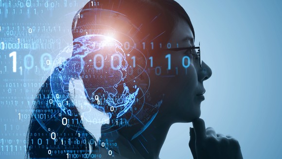 A side profile of a person, with ones and zeroes superimposed over their face.