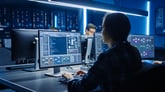 cybersecurity technician working with a software program