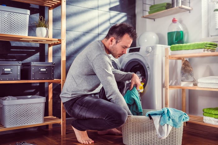 A person doing laundry.