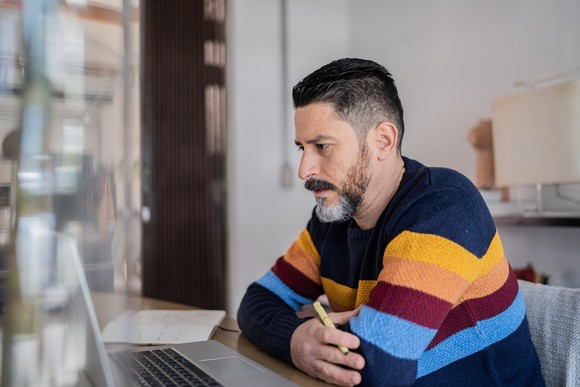 A person at a laptop.