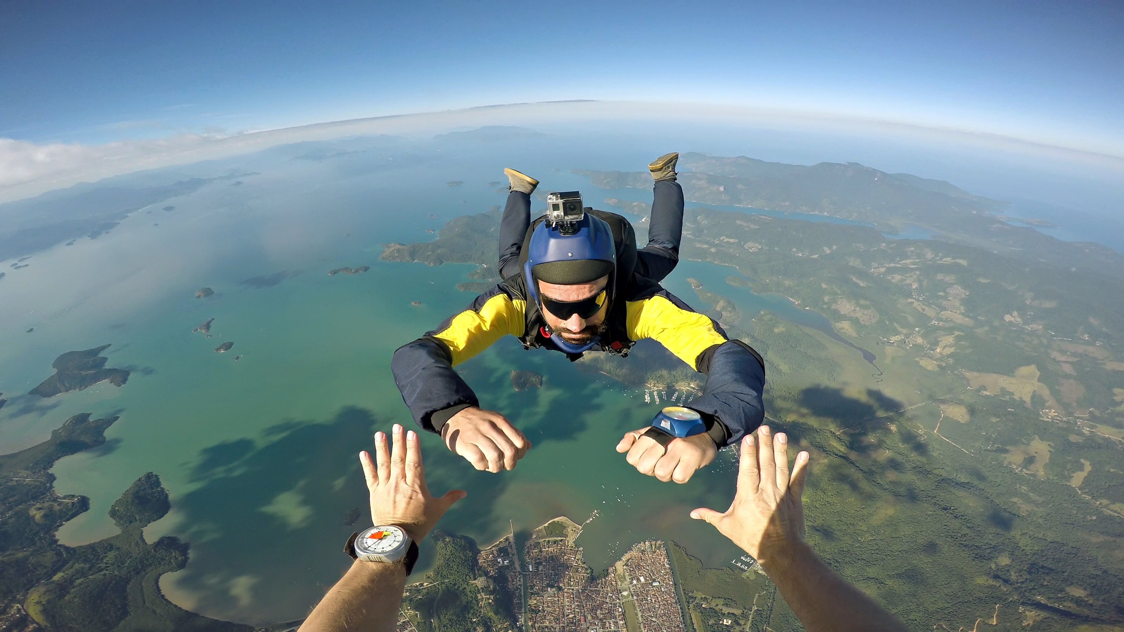 Skydiving person with a camera strapped to their helmet