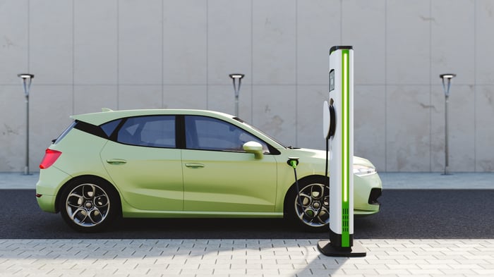  An electric car being charged.