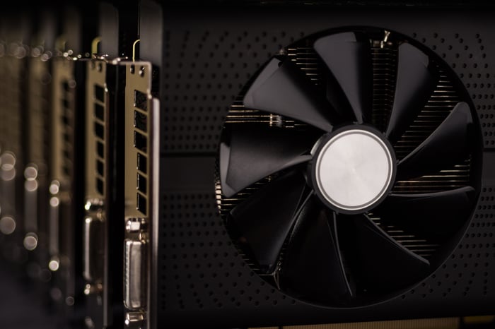 Multiple graphics processing units lined up next to each other.